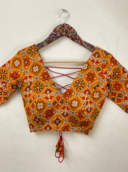 NAVELI – Mustard Yellow Patola Print Backless Blouse
