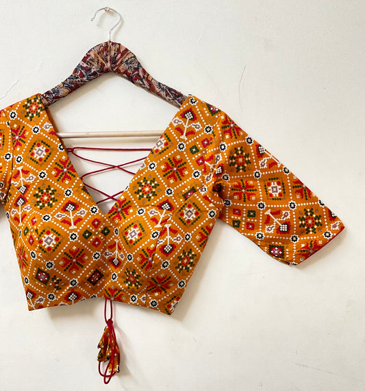 NAVELI – Mustard Yellow Patola Print Backless Blouse