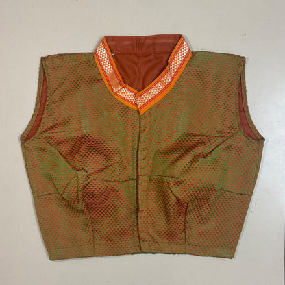 Green  vest with orange trim on a white background