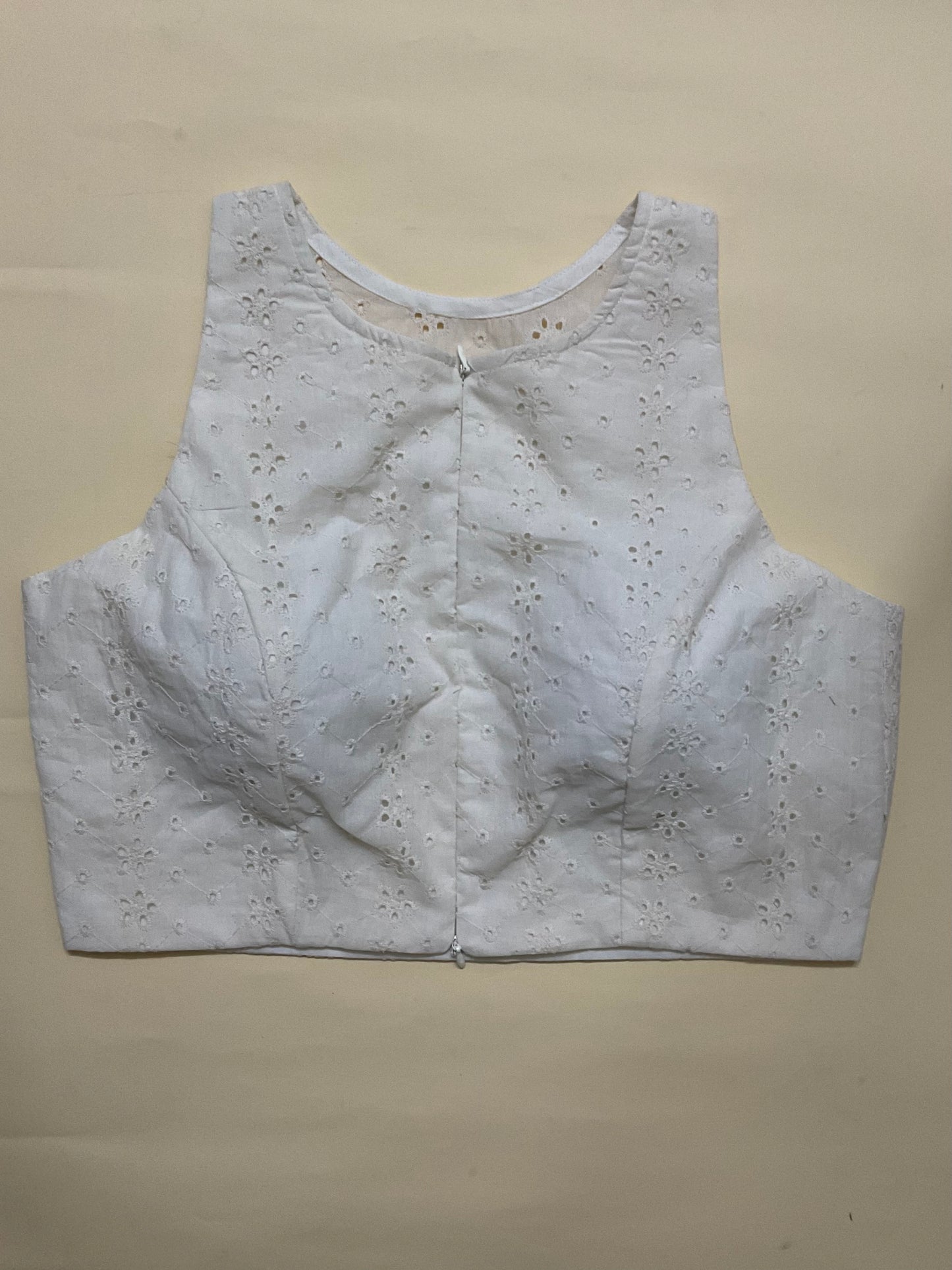 Sleeveless chickenkari blouse with invisible front zippers and fusing