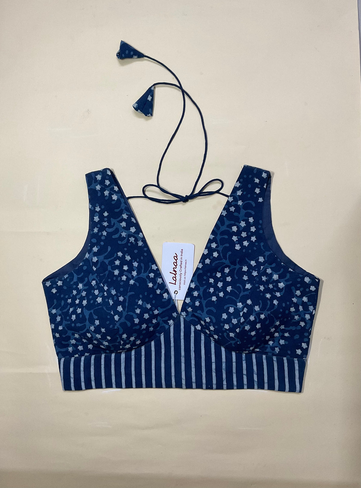 Indigo sleeveless deep-v neck blouse with contrast