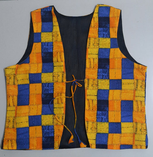 Vest with a checkered pattern of orange and blue on a gray background