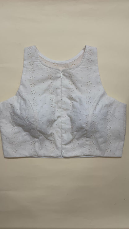 Sleeveless chickenkari blouse with invisible front zippers and fusing