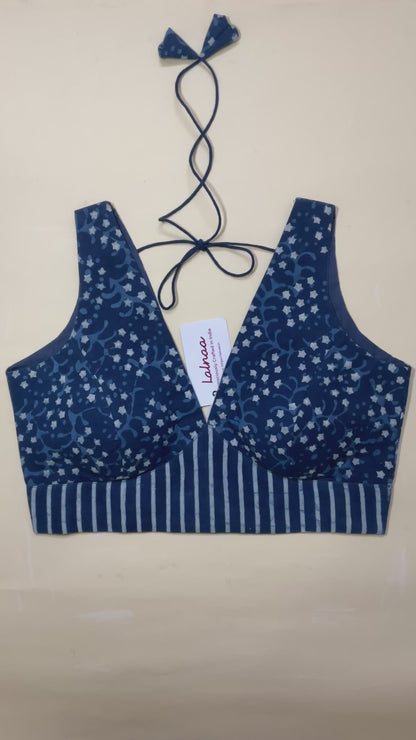 Indigo sleeveless deep-v neck blouse with contrast